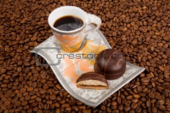 Coffee cup with sweets 