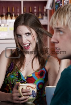 Woman flirting with male friend
