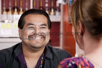 Native American man with female friend in restaurant