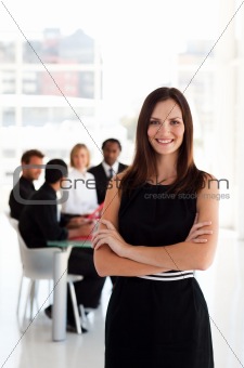 Happy business woman smiling at camera