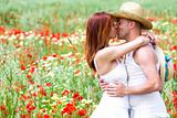 Happy young couple on a meadow