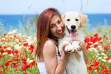 Happy young woman with dog