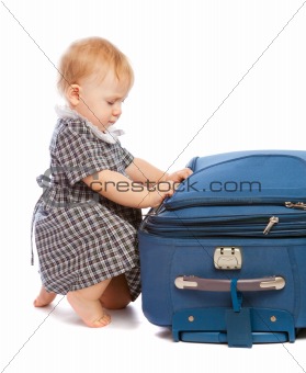 Baby and suitcase