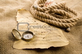Golden compass on letter