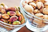 Pistachio nuts in glass bowls