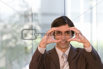 portrait of young confident business man in focus