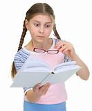 Girl with the book and eyeglasses