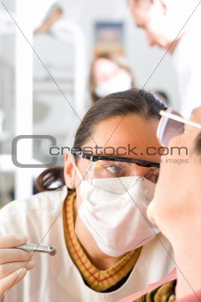 Young dentist at clinic