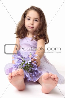 Toddler girl with flowers