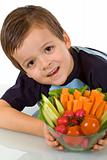 Little boy with fresh vegetables