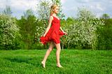Young beautiful woman in a red dress