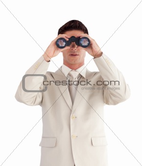 Man looking straight ahead through a binnoculars