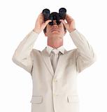 Businessman looking Upwards ahead through a binoculars
