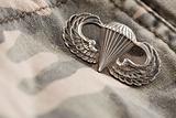 Paratrooper War Medal on a Camouflage Material.