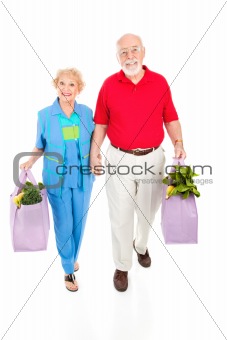 Seniors With Reusable Shopping Bags