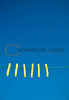 Yellow clothes Pegs