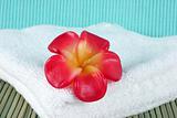 Candle on a white towel - spa products