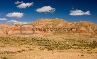 Desert and mountains under the blue sky