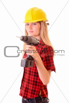 Young woman in helmet with drill isolated on white
