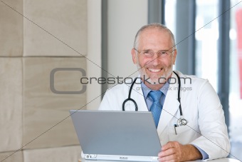 Portrait of a  senior caring doctor