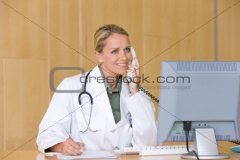 Attractive young caring doctor