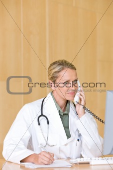 Attractive young caring doctor