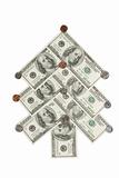 Fir tree made of dollars and cents isolated