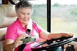 RV Senior - Woman Using GPS