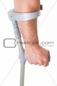 hand holding crutch