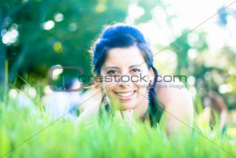 Beautiful Girl lying in the Grass