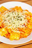 Italian pasta with cheese and tomato