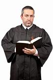 Judge holding the gavel and book