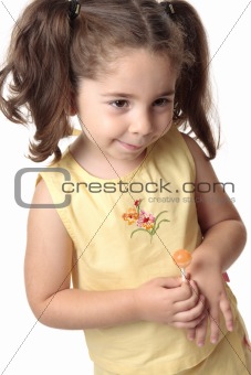 Shy toddler girl smiling
