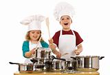 Happy kids dressed as chefs making noise