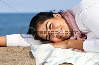 Young native american woman at beach