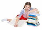 Girl sits having leant the elbows on a books