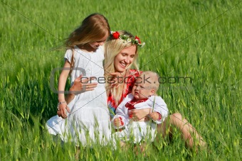 happy mother with two children outdoors