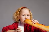 Girl with milk and French bread