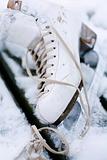 Close-up of a white ice skate.