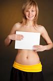beautiful girl topless with a blank page.