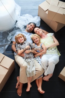 Family sleeping in its new house