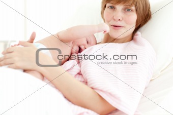Patient and newborn baby in hospital
