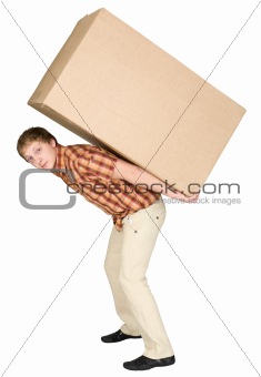 Young man bears the big box on a back