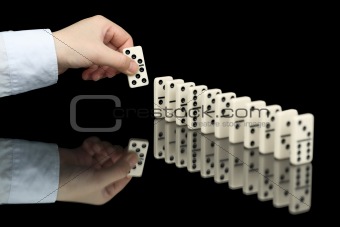 Domino bone in hand