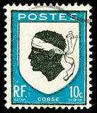 vintage postage stamp with corsica national emblem