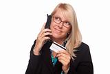 Beautiful Blonde Woman with Phone and Credit Card Isolated on a White Background.