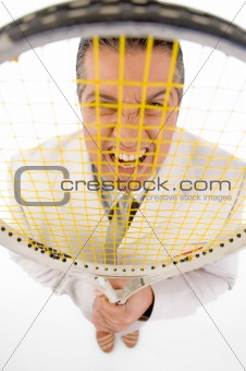 top view of boss holding tennis racket
