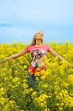 happy girl in yellow field