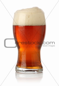 Fresh glass of beer isolated on white