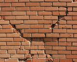 Damaged brick wall 